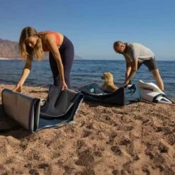 Gladiator Origin 10'4 X 30" Paddleboard 2023 -RED PADDLE CO. Sales gladiator 10 8 origin unrolling on beach