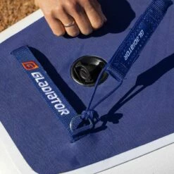 Gladiator Elite S 12'6 X 30" Paddleboard 2023 -RED PADDLE CO. Sales gladiator elite putting leash on board 3